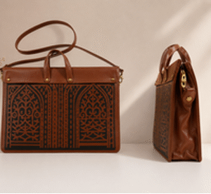 Heritage Arch Cutwork Leather Sling Bag